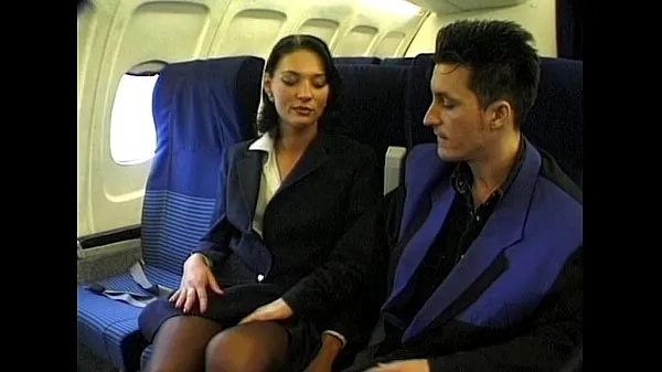 Brunette beauty wearing stewardess uniform gets fucked on a plane clip hấp dẫn Video